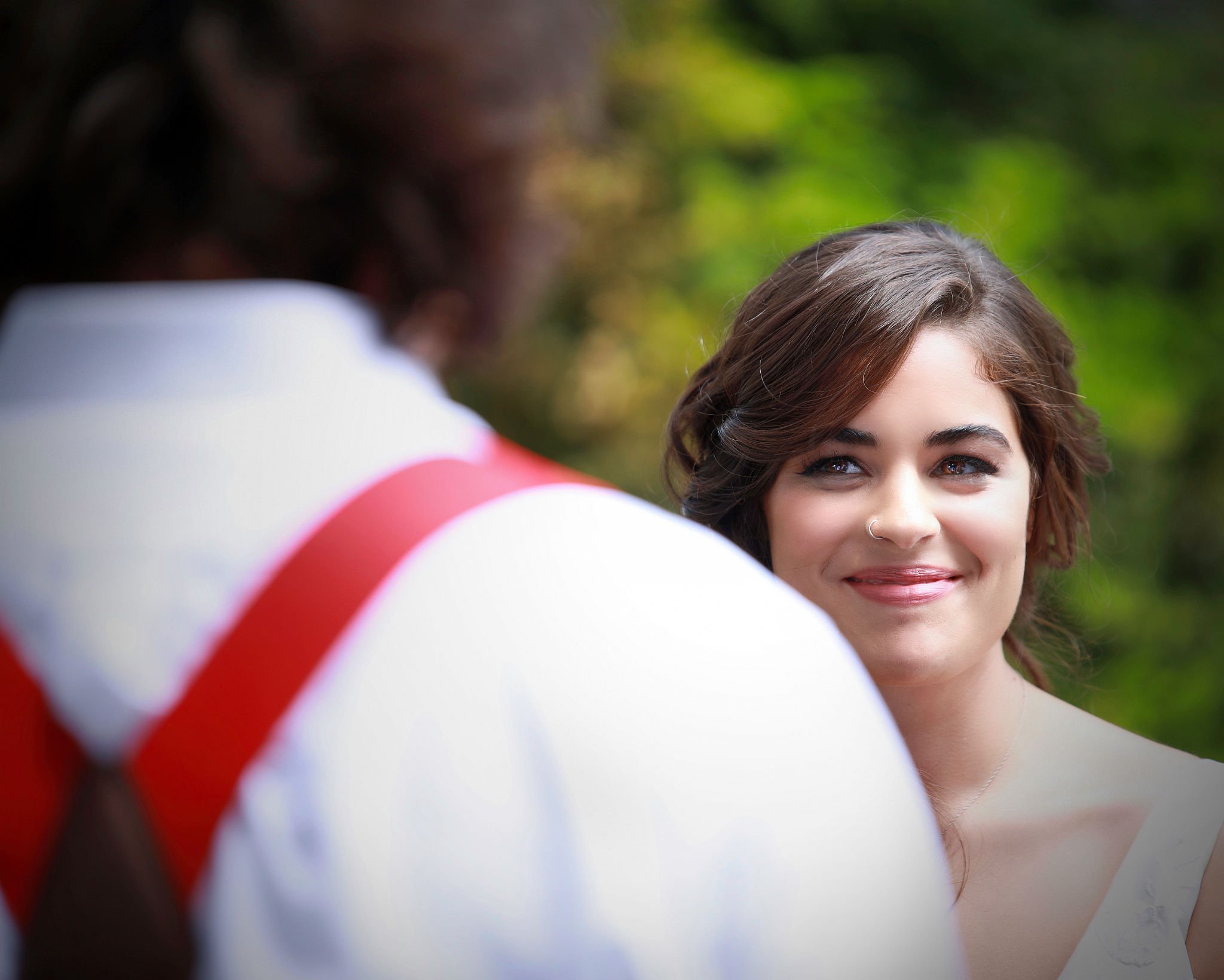 Bride looking at her groom during ceremony
